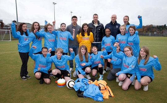 Aston Villa players Ron Vlaar and Enda Stevens launch the Premier League Players' Kit Scheme at local school Streetly Academy