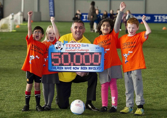 Owen Coyle with school children at the announcement