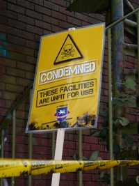 A Club Website 'condemned' sign and tape